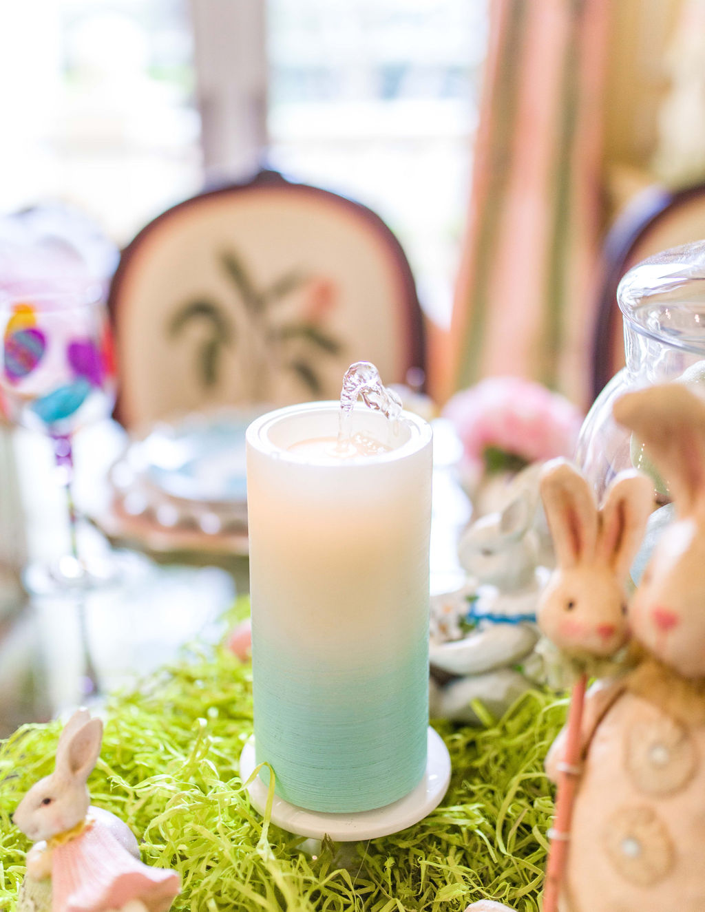 Easter dining room decor by Turtle Creek Lane. Water candles home decor